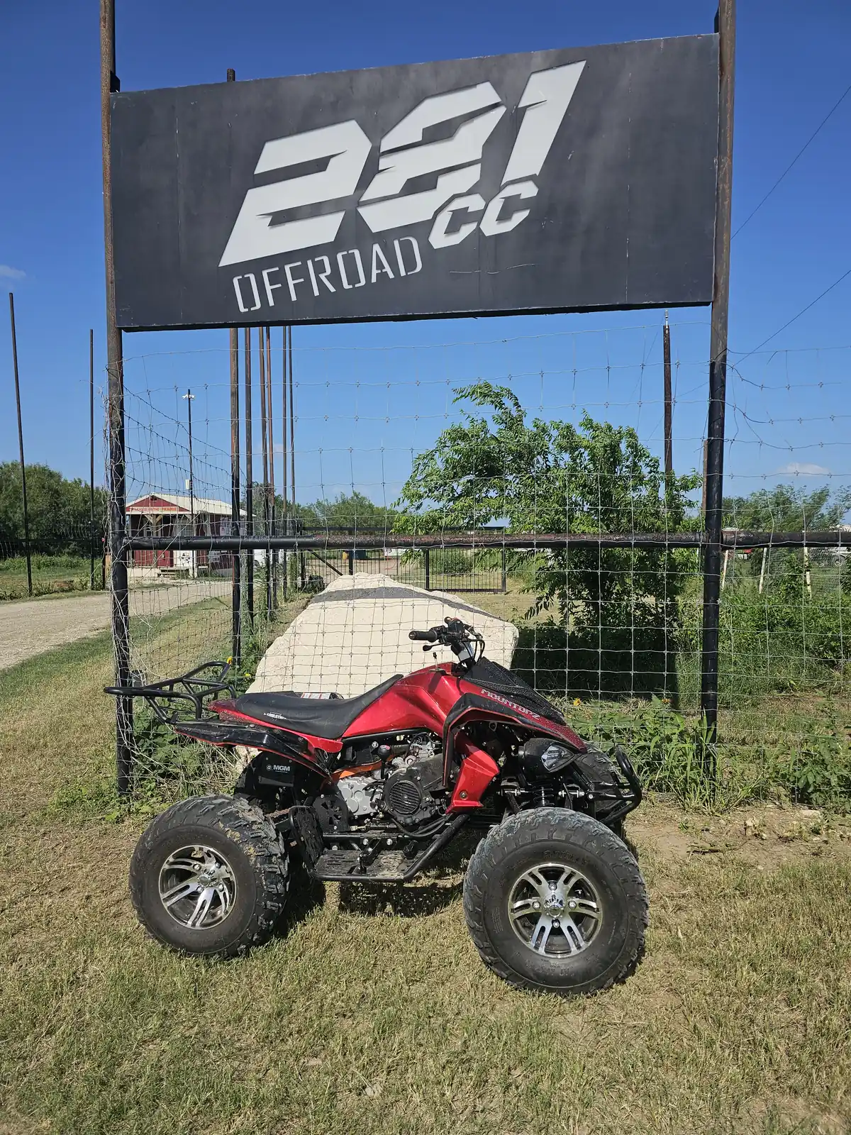 Rider on a full-size ATV on the trails at 281 Country Club in San Antonio